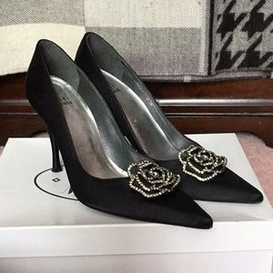 Black satin Stewart Weitzman heels w/ crystal rose